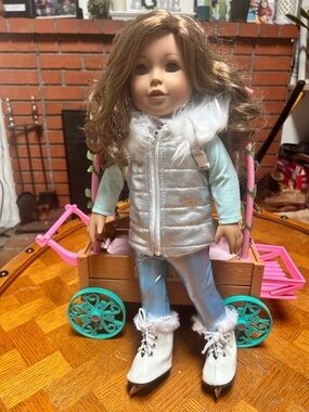 Silver Puffy Vest Doll Outfit with Light Blue Top and White Ice Skate Boots